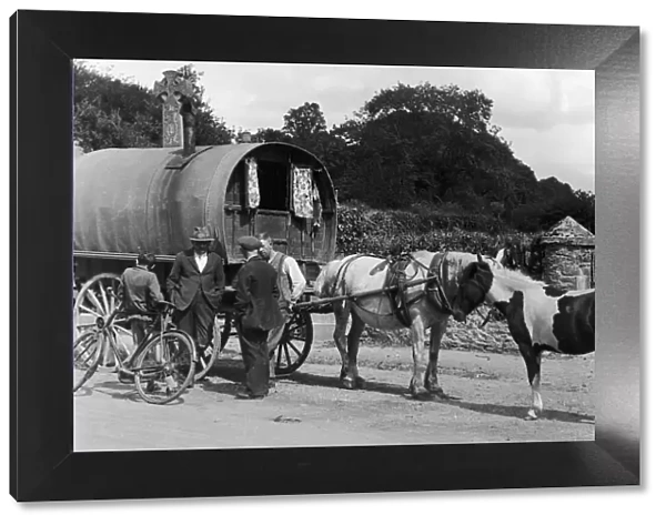 A typical Irish timber travelling carriage seen here in Killarney. 8th November 1935