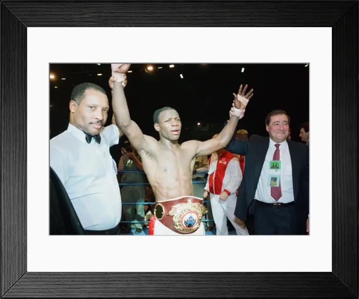Framed Print : Chris Eubank celebrates his victory over Nigel Benn at the NEC in Birmingham