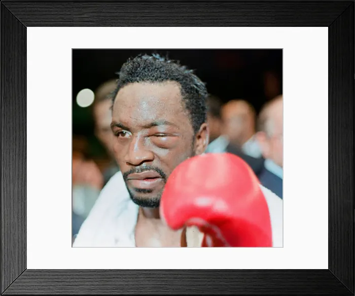 Framed Print : Nigel Benn leaves the ring at the NEC in Birmingham. 18th November 1990 after losing to Framed Print : Nigel Benn leaves the ring at the NEC in Birmingham. 18th November 1990 after losing to