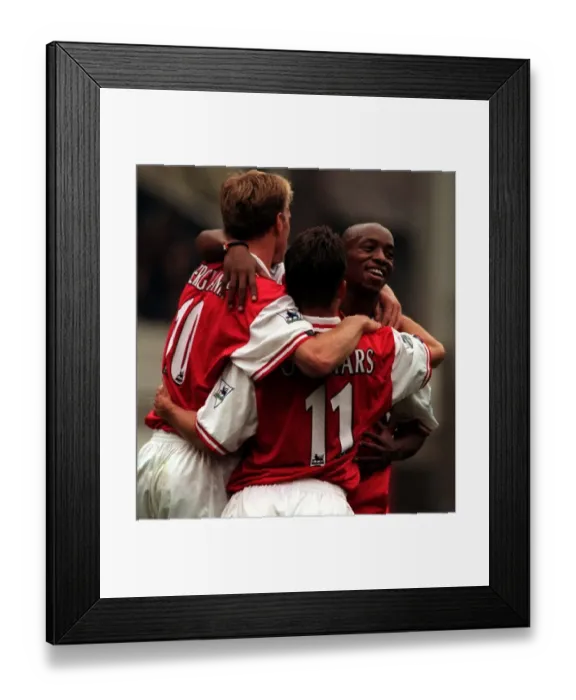 Framed Print : Ian Wright and Dennis Bergkamp celebrate after goal 1997 with Marc Overmars after