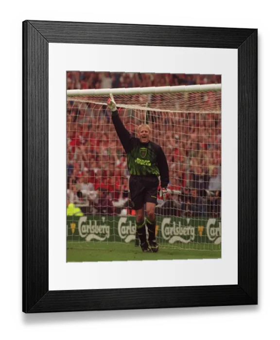 Framed Print : Peter Schmeichel Manchester United goalkeeper celebrates after saving penalty kick during