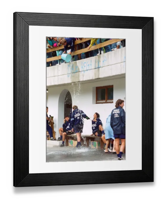 Framed Print : Lazio footballer Paul Gascoigne has a bucket of water tipped over him by teammate Beppe