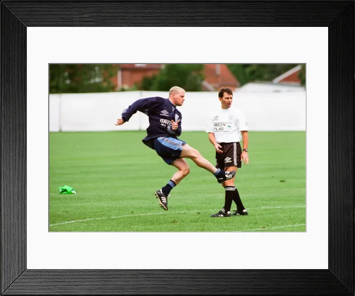 Framed Print : England footballer Paul Gascoigne practices his shooting during a training session