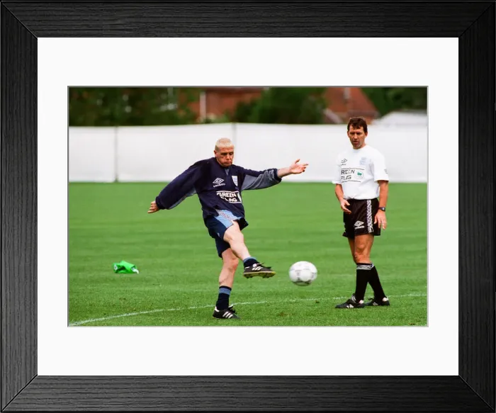 Framed Print : England footballer Paul Gascoigne practices his shooting during a training session