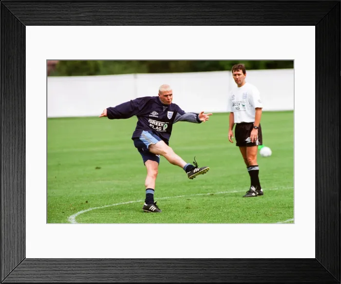 Framed Print : England footballer Paul Gascoigne practices his shooting during a training session Framed Print : England footballer Paul Gascoigne practices his shooting during a training session