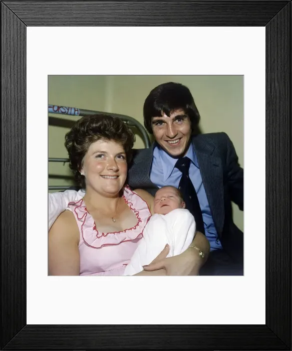Framed Print : Rangers and Scotland footballer Tom Forsyth in the maternity hospital with his wife Linda