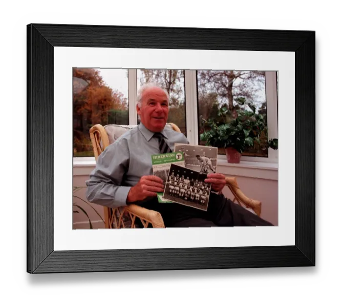 Framed Print : Hibernian football legend Lawrie Reilly at home with mememtoes of his playing career Framed Print : Hibernian football legend Lawrie Reilly at home with mememtoes of his playing career