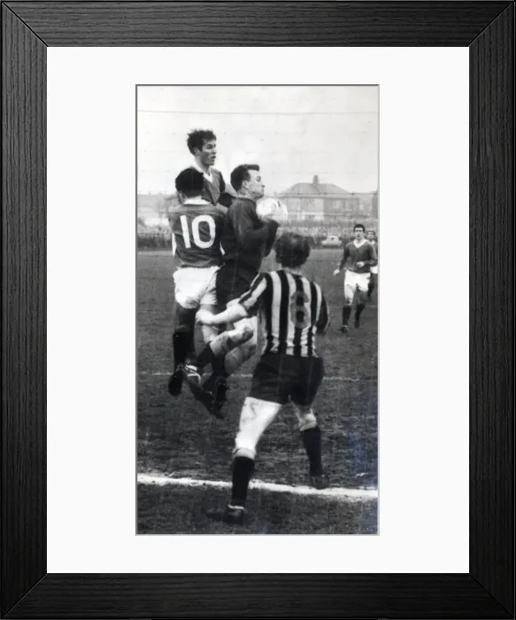 Framed Print : Player manager Jock Wallace clears from mclean and forrest at Berwick circa 1965