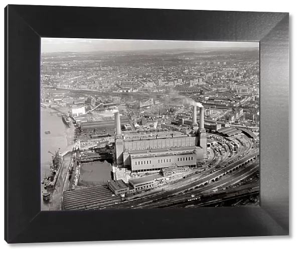 Aerial view of London with Battersea power station in foreground August 1959