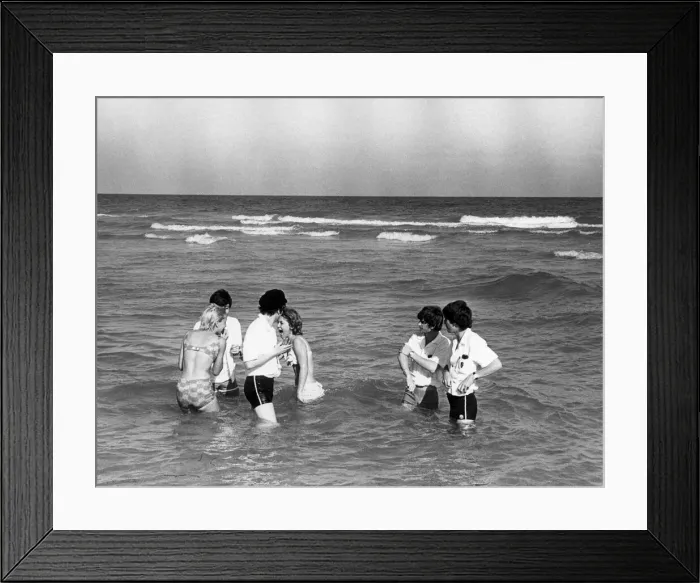 Framed Print : The Beatles swimming in Miami with some female admirers. 14th February 1964 Framed Print : The Beatles swimming in Miami with some female admirers. 14th February 1964