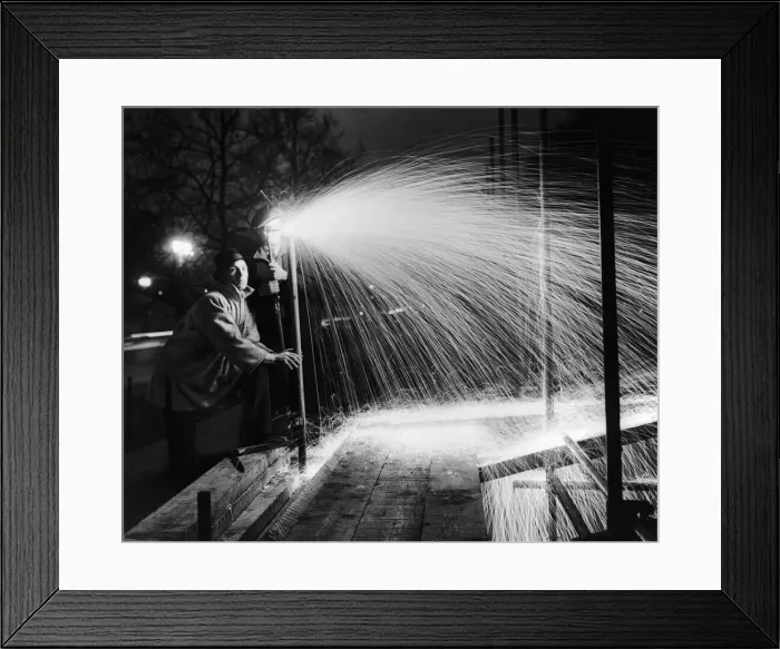 Framed Print : Steelworkers construction stands in the Mall in preparation for the fireworks display