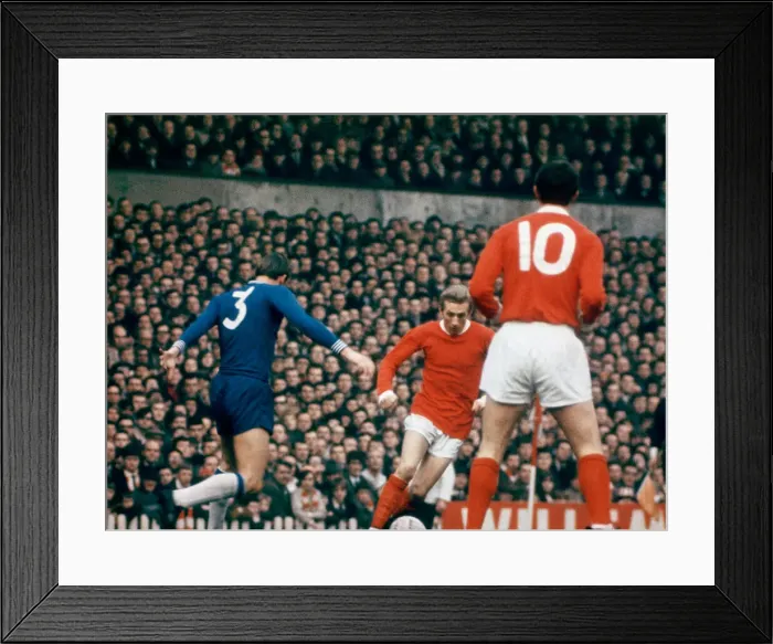 Framed Print : Denis Law of Manchester United in action during the Division One league match against Framed Print : Denis Law of Manchester United in action during the Division One league match against