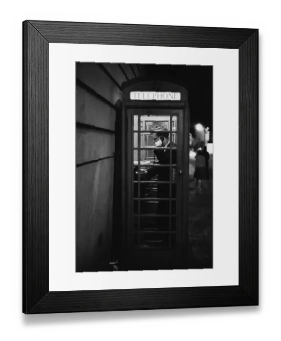 Framed Print : A man making a call from a public telephone box in London. 31st August 1958