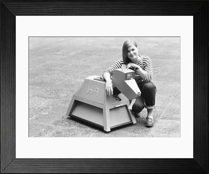 Framed Print : Ace played by Sophie Aldred seen here with the doctors robot dog K9. 12th September 1987 Framed Print : Ace played by Sophie Aldred seen here with the doctors robot dog K9. 12th September 1987