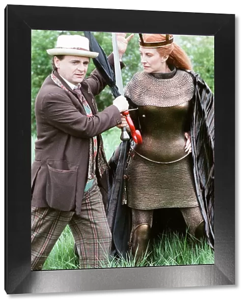Sylvester McCoy as the Doctor with Jean Marsh as Morgaine whilst on location filming for