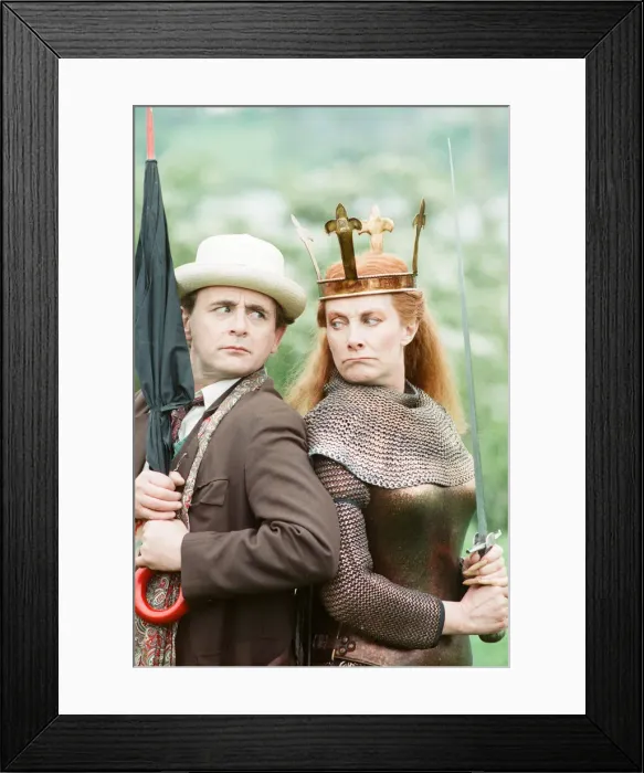 Framed Print : Sylvester McCoy as the Doctor with Jean Marsh as Morgaine whilst on location filming for