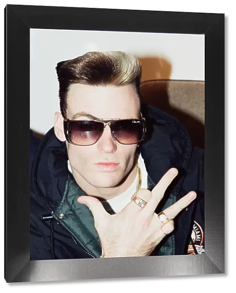 American rapper Vanilla Ice poses during his visit to London. 3rd December 1990