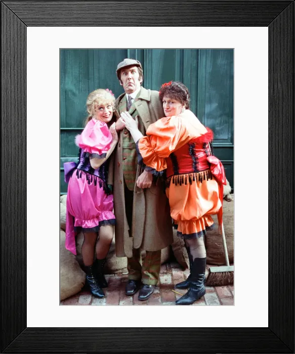 Framed Print : Comedian Russ Abbott dressed as Sherlock Holmes flanked by Sherrie Hewson (left Framed Print : Comedian Russ Abbott dressed as Sherlock Holmes flanked by Sherrie Hewson (left