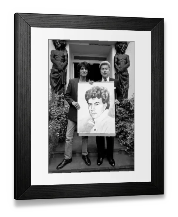 Framed Print : Rolling Stones: Ronnie Wood holds a painting of author Ken Follett who stands next to him Framed Print : Rolling Stones: Ronnie Wood holds a painting of author Ken Follett who stands next to him