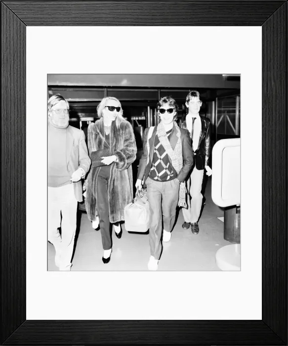 Framed Print : Rolling Stones. Mick Jagger and Jerry Hall leaving London Airport Heathrow for a Framed Print : Rolling Stones. Mick Jagger and Jerry Hall leaving London Airport Heathrow for a