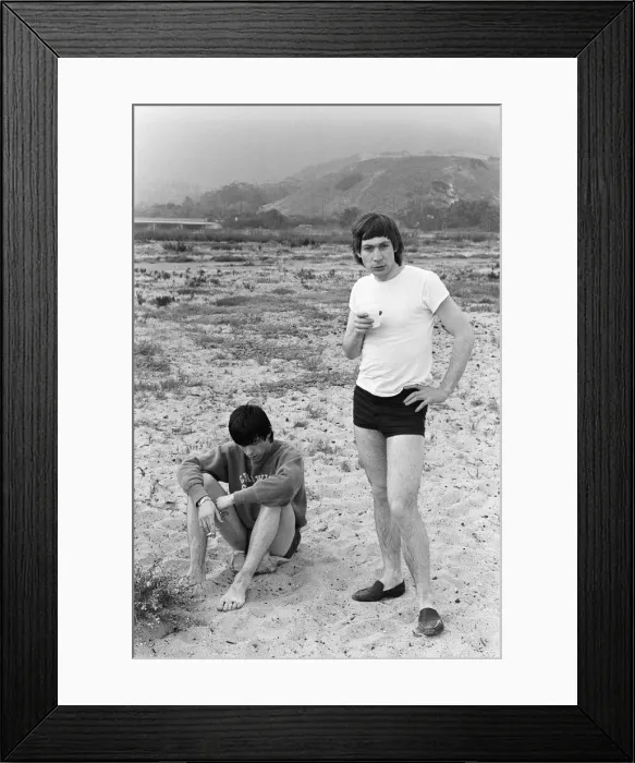 Framed Print : The Rolling Stones. Keith Richards and Charlie Watts seen here posing on Malibu beach