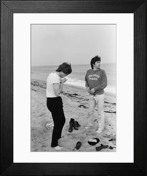 Framed Print : The Rolling Stones. Keith Richards and Charlie Watts seen here posing on Malibu beach