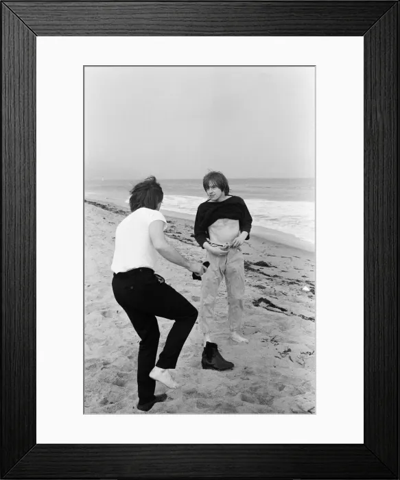 Framed Print : The Rolling Stones. Charlie Watts and Brian Jones seen here posing on Malibu beach Framed Print : The Rolling Stones. Charlie Watts and Brian Jones seen here posing on Malibu beach