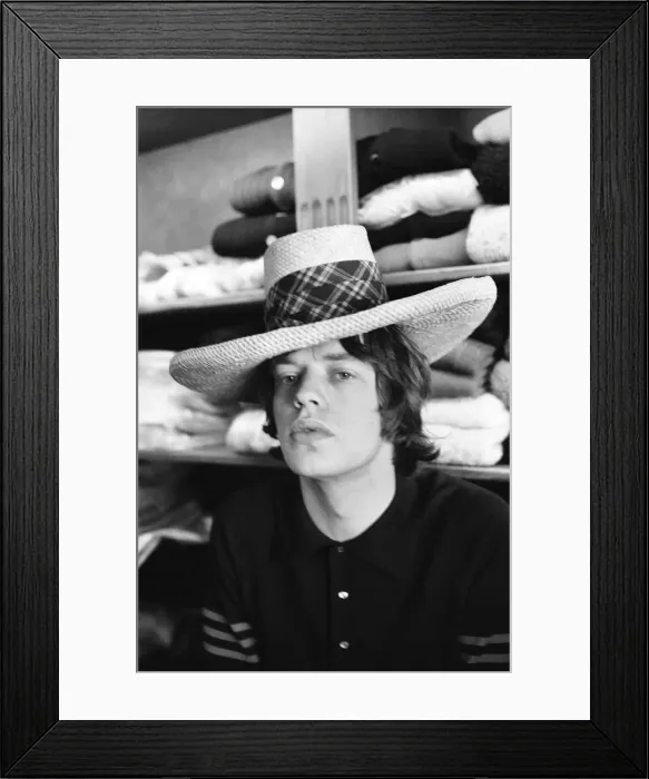 Framed Print : Mick Jagger on the morning of 4 June 1964 when The Rolling Stones were taken shopping by