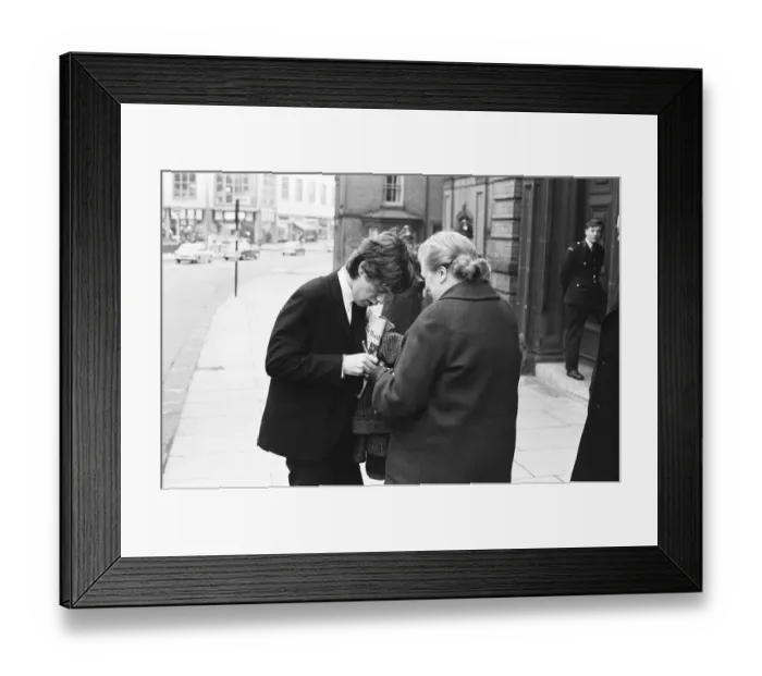 Framed Print : Rolling Stones; Mick Jagger signs an autograph outside the court at Tattenhall Framed Print : Rolling Stones; Mick Jagger signs an autograph outside the court at Tattenhall
