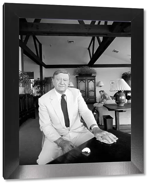 John Wayne who recently starred in Brannigan at home in Texas