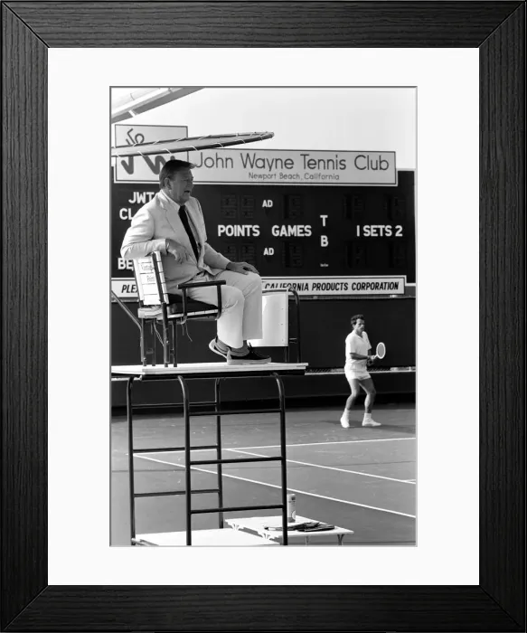 Framed Print : John Wayne who stars in Brannigan. Seen here at his tennis club Framed Print : John Wayne who stars in Brannigan. Seen here at his tennis club