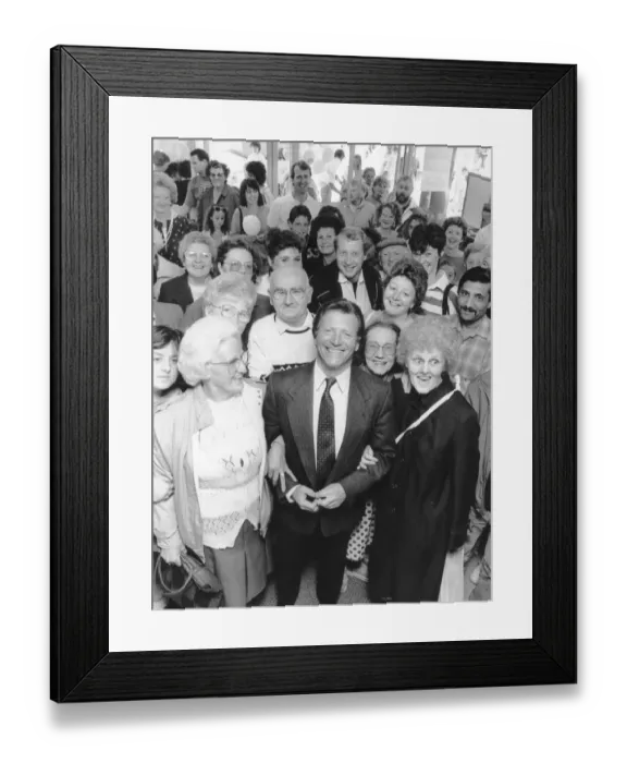 Framed Print : A seething mass of fans greeted Coronation Street star Johnny Briggs when he opened a new Framed Print : A seething mass of fans greeted Coronation Street star Johnny Briggs when he opened a new