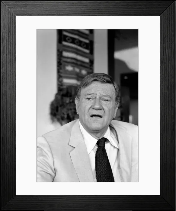 Framed Print : John Wayne who recently starred in Brannigan photographed at home in Texas Framed Print : John Wayne who recently starred in Brannigan photographed at home in Texas