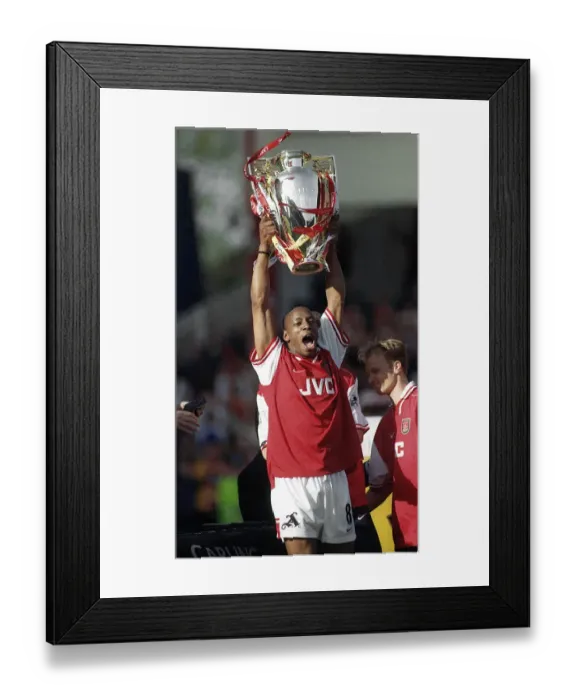 Framed Print : Ian Wright Arsenal celebrates after winning the May 1998 FA Carling Premiership title Framed Print : Ian Wright Arsenal celebrates after winning the May 1998 FA Carling Premiership title