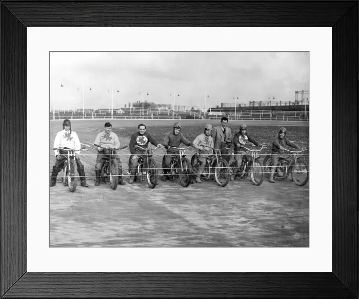 Framed Print : Cardiff Speedway riders line up for a practice at the new Penarth Road Stadium Framed Print : Cardiff Speedway riders line up for a practice at the new Penarth Road Stadium