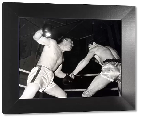 Pontypridd Boxer Len Rocky James - (left) in action against Carl Gizzi at