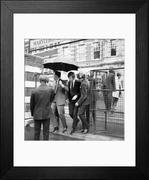Framed Print : Rolling Stones: manager Andrew Loog Oldham and his chauffeur Reg Stiles (sunglasses Framed Print : Rolling Stones: manager Andrew Loog Oldham and his chauffeur Reg Stiles (sunglasses