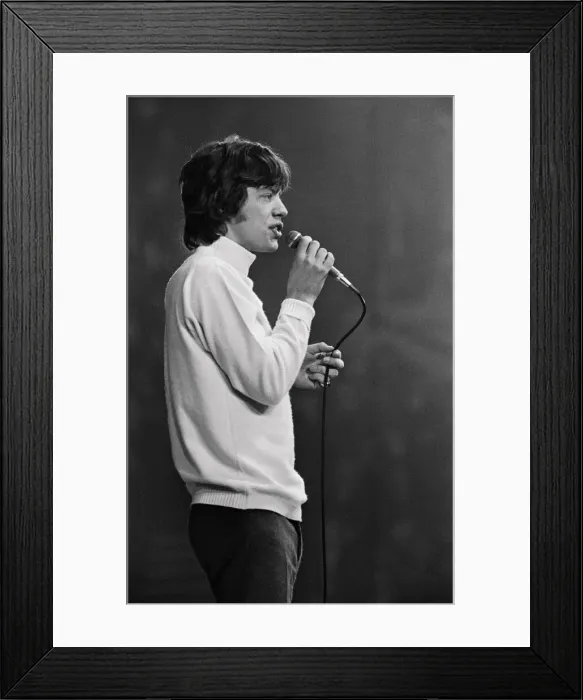 Framed Print : Rolling Stones lead singer Mick Jagger performing on stage at the New Musical Express