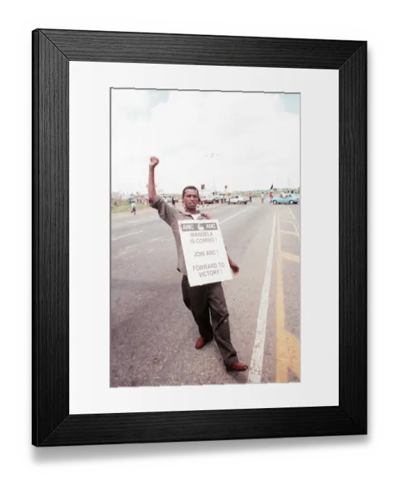 Framed Print : A resident of Soweto seen here on his way to the Soccer City stadium to see