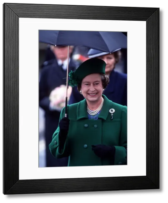 Framed Print : Her Majesty Queen Elizabeth II holds an umbrella during her visit to Torbay to celebrate Framed Print : Her Majesty Queen Elizabeth II holds an umbrella during her visit to Torbay to celebrate