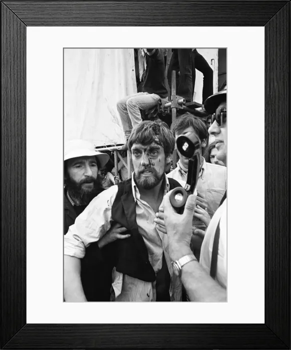 Framed Print : Rolling Stones Concert in Hyde Park. An injured fan points out a member of The Hell Framed Print : Rolling Stones Concert in Hyde Park. An injured fan points out a member of The Hell