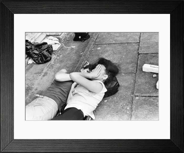 Framed Print : The Rolling Stones at Longleat, home of Lord Bath. Exhausted fans are attended to Framed Print : The Rolling Stones at Longleat, home of Lord Bath. Exhausted fans are attended to