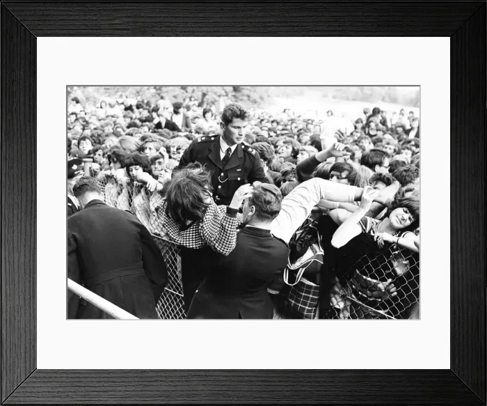 Framed Print : The Rolling Stones at Longleat, home of Lord Bath. Fainting girl fans are carried Framed Print : The Rolling Stones at Longleat, home of Lord Bath. Fainting girl fans are carried