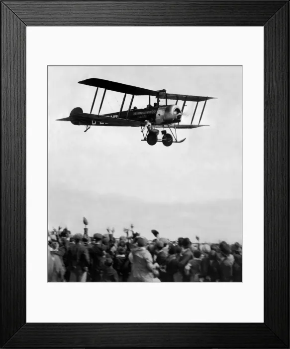 Framed Print : An Avro 504 biplane carries a daring wing walker of the Cornwall Aviation Co. Ltd Framed Print : An Avro 504 biplane carries a daring wing walker of the Cornwall Aviation Co. Ltd