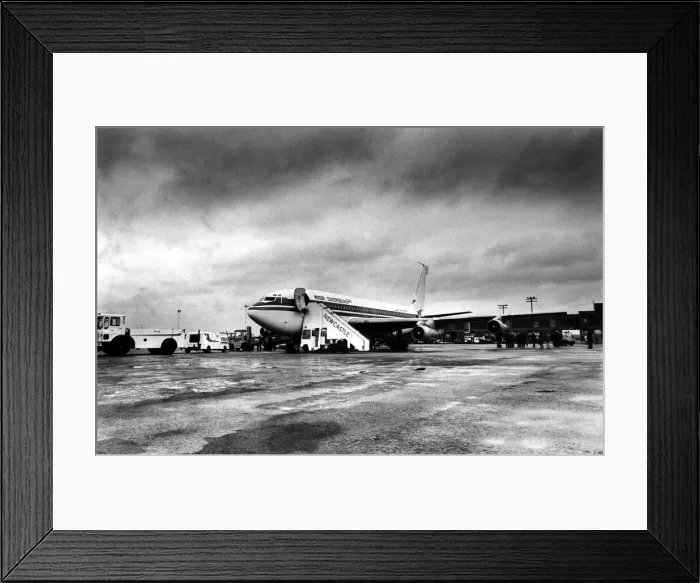 Framed Print : A MISR Egyptian Airlines is loaded up before take off at Newcastle Airport