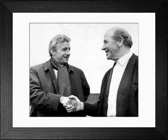 Framed Print : Manchester United footballer Denis Law shakes hands with his manager Matt Busby at Old Framed Print : Manchester United footballer Denis Law shakes hands with his manager Matt Busby at Old
