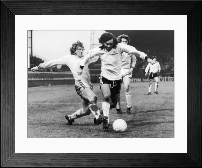 Framed Print : Fulham v. Burnley. George Best of Fulham flies past Smith of Burnley Framed Print : Fulham v. Burnley. George Best of Fulham flies past Smith of Burnley
