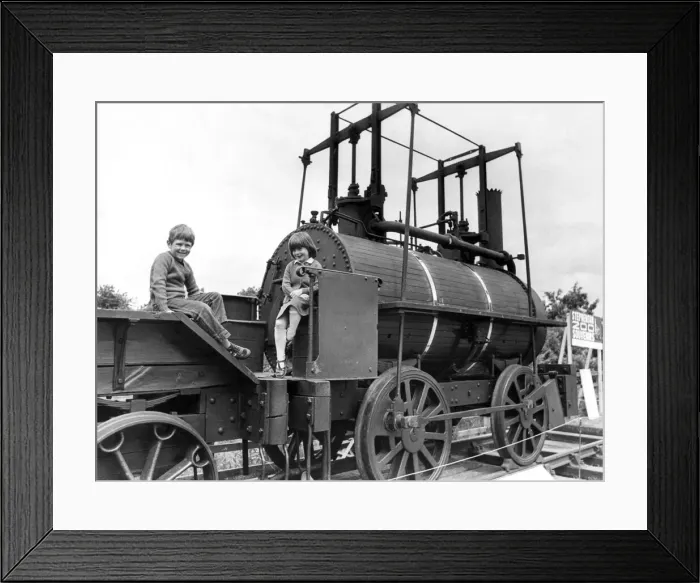 Framed Print : Jonathon Thornton, 5, and Sarah Anson, 6, of Ovington sitting on Killingworth Billy Framed Print : Jonathon Thornton, 5, and Sarah Anson, 6, of Ovington sitting on Killingworth Billy