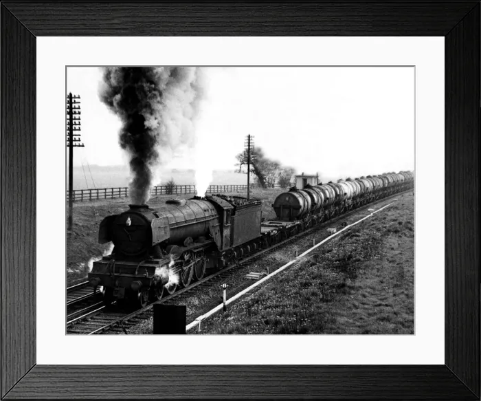 Framed Print : One of the diminishing number of steam engines still operating is seen hauling a freight Framed Print : One of the diminishing number of steam engines still operating is seen hauling a freight