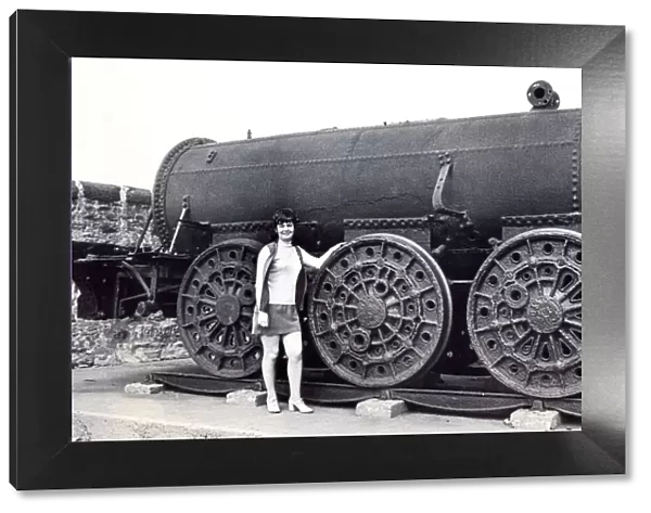 Linda Iley beside Braddyll on 6th May 1973, an old engine that once served as a snow plow